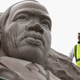 Sculptor Lei Yixin stands on top of a scaffolding to observe the statue of Martin Luther King Jr. on Aug. 1, 2013, at the Martin Luther King Jr. Memorial in Washington, D.C.